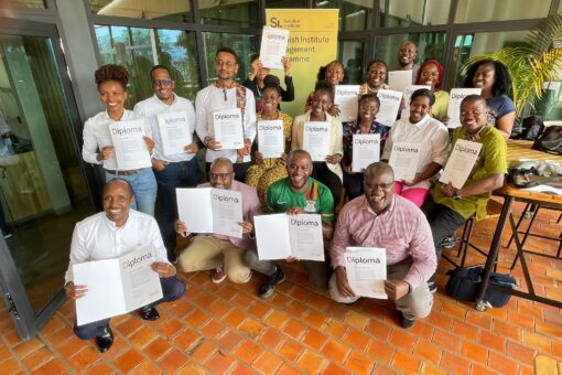 A group of SIMP Africa participants showing their diplomas