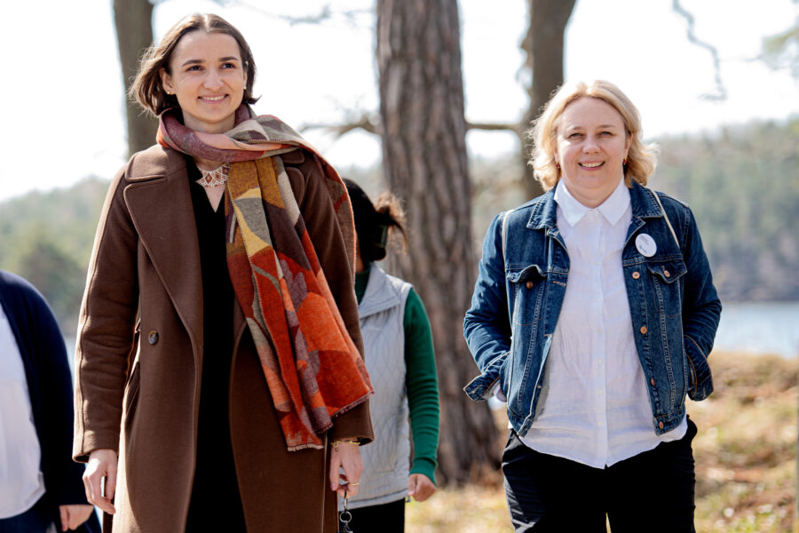 Two women walking in the nature.