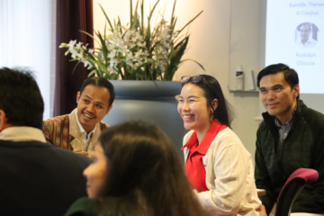 Participants of SIMP Asia sit in a group discussion