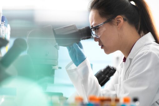 Woman using a microscope