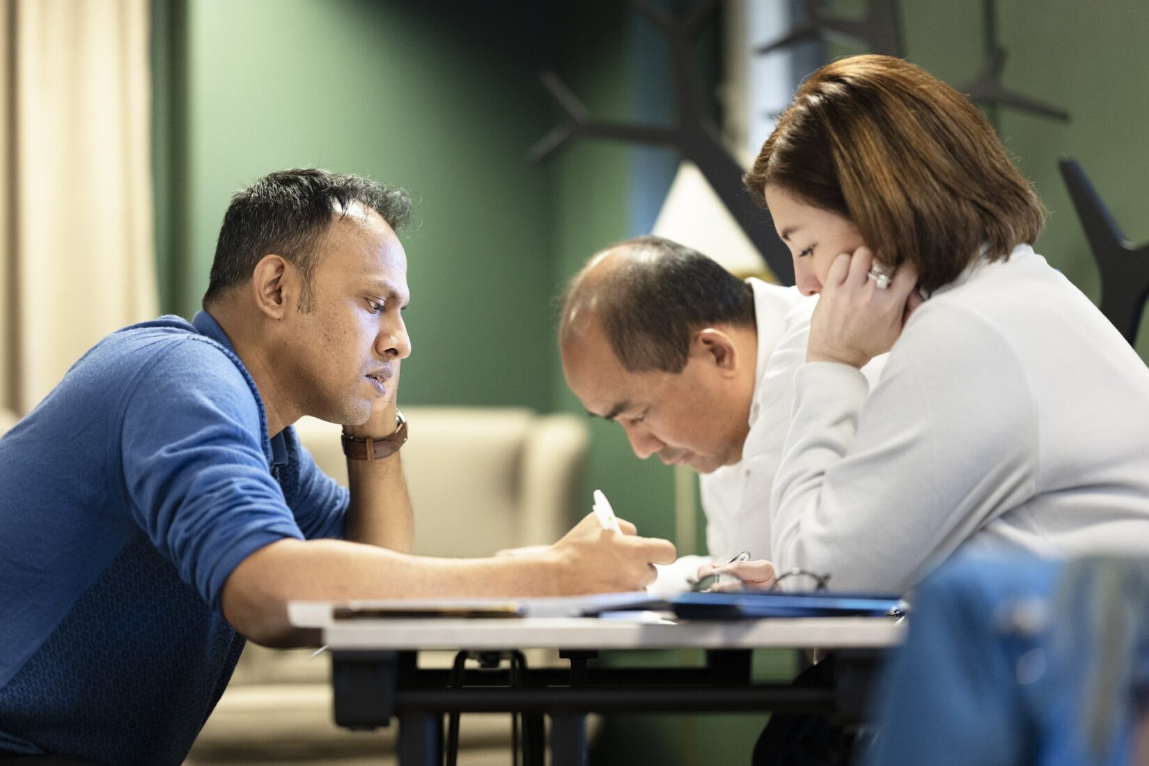 Three people at a table