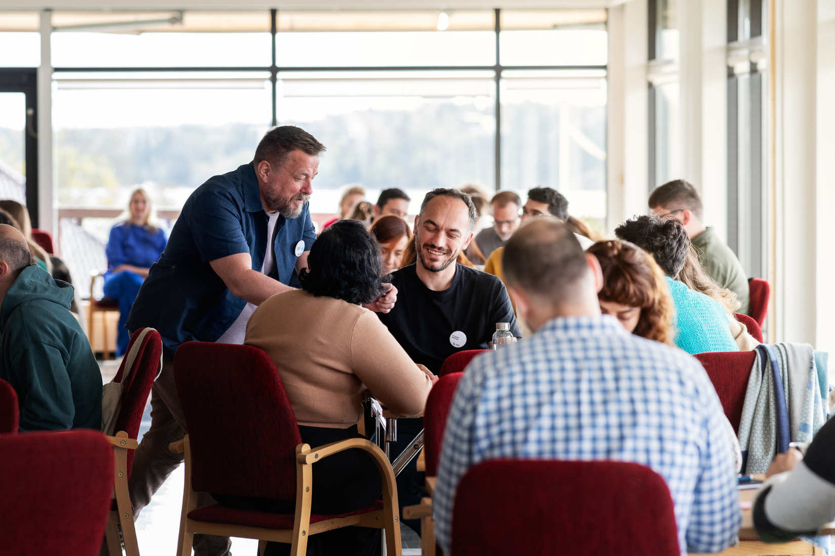 Photo of participants sitting around a table.