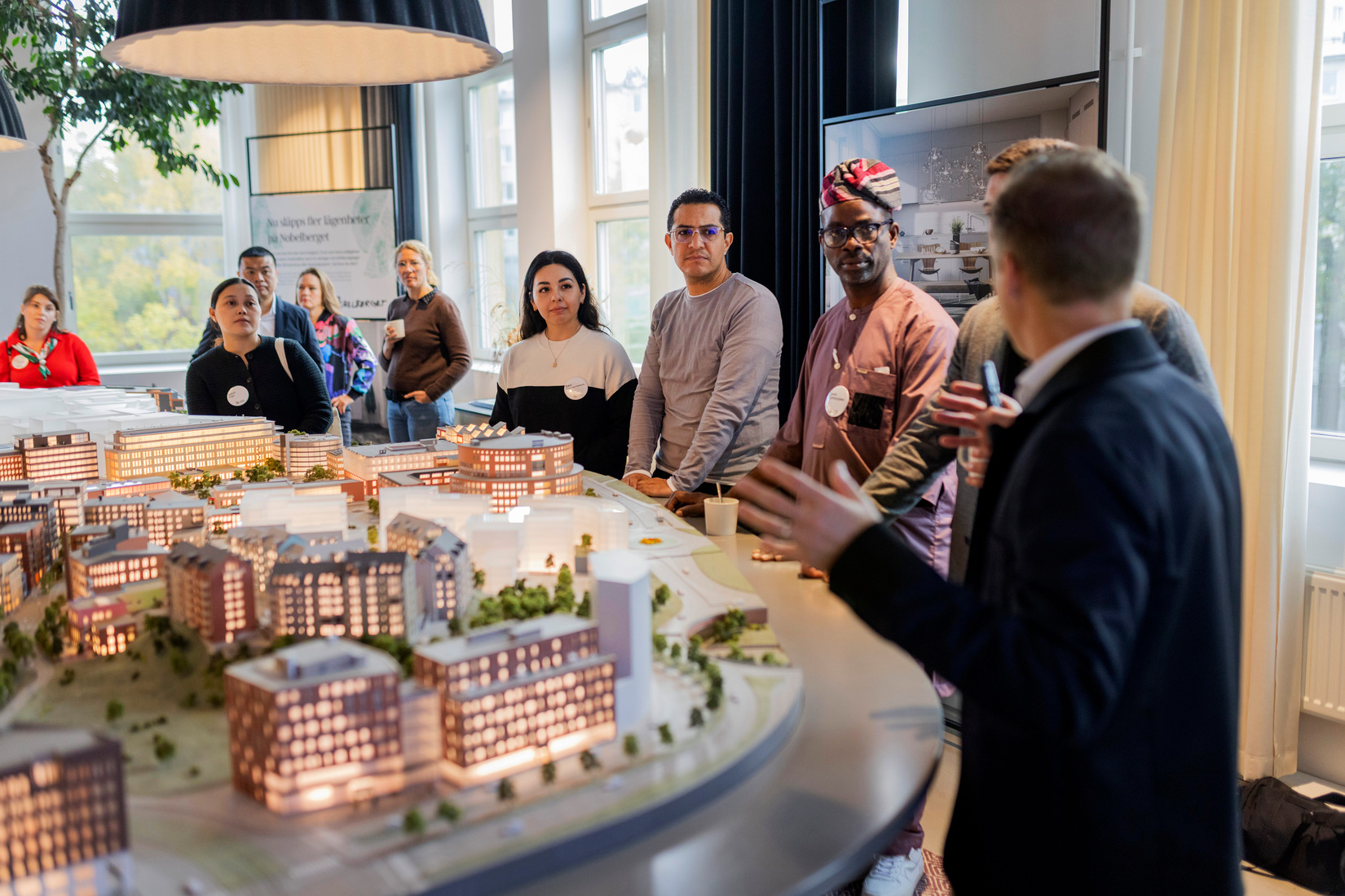 Group of participants listening to a presentation.